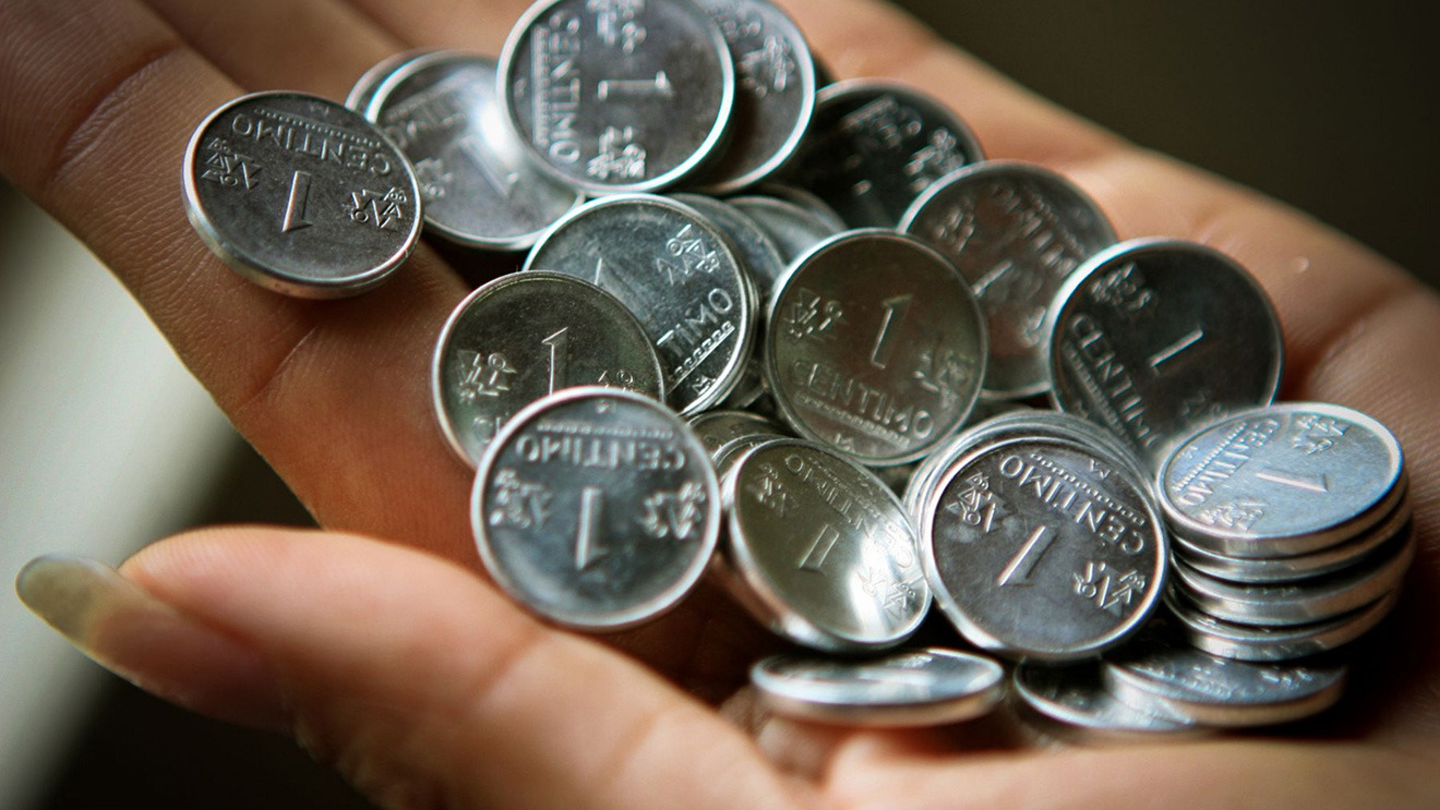 Is the One-Cent Coin Efficient?