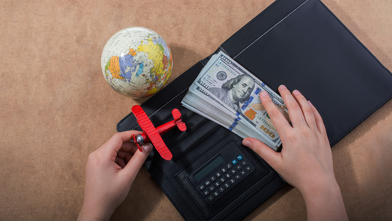 A Quantitative General Equilibrium Approach to Migration, Remittances and Brain Drain